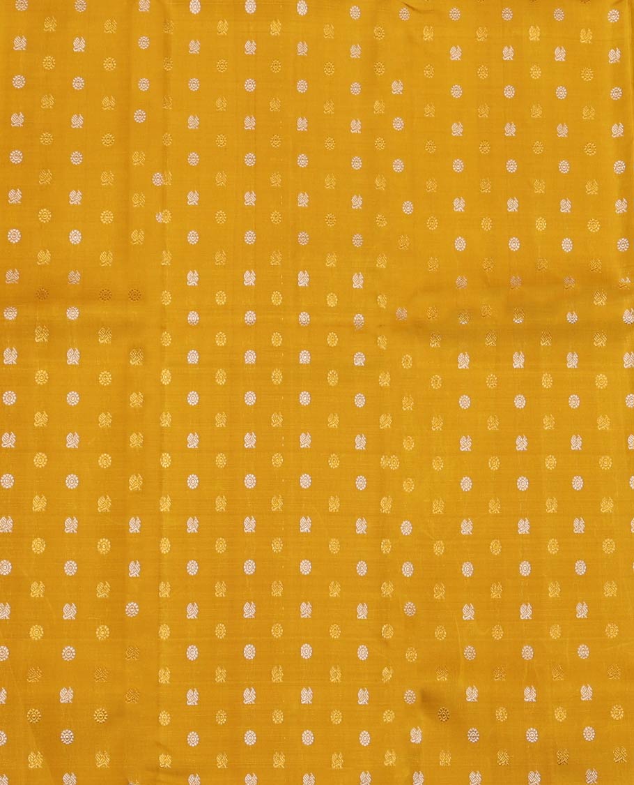Yellow Pure Silk Half-Saree, Artfully Detailed with Mayil-Chakram Buttas on Its Skirt, Complemented by a Contrast Border of Rekku, Muthu, Diamond, Chakram, and Jaal Designs, Comes with a Contrast Blouse and a Dhavani of Jacquard Design