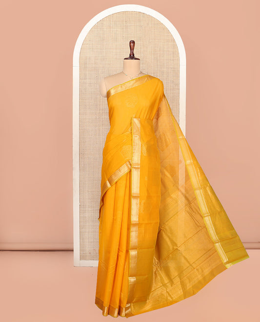 Yellow Silk Cotton Saree, Sparsely Woven with Geometric Buttas All Over Its Body, Highlighted by Traditional Zari Designs Woven Border, Grand Jaal Pallu and Paired with a Matching Blouse