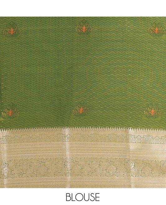 Green Art Silk Material Half Saree Set, Delicately Woven with Zari Buttas on Its Skirt, Complemented by a Contrast Traditional Zari Design Border, Paired with a Contrast Blouse, and Intricately Designed Dhavani