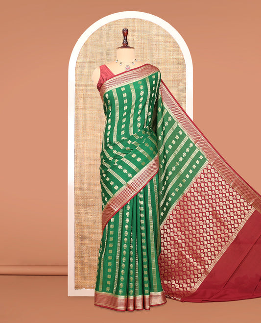 Green Mysore Silk Saree, Adorned with Peacock and Two-Headed Eagle Buttas, Complemented by a Contrast Traditional Zari Border, Intricate Pallu, and a Contrast Blouse