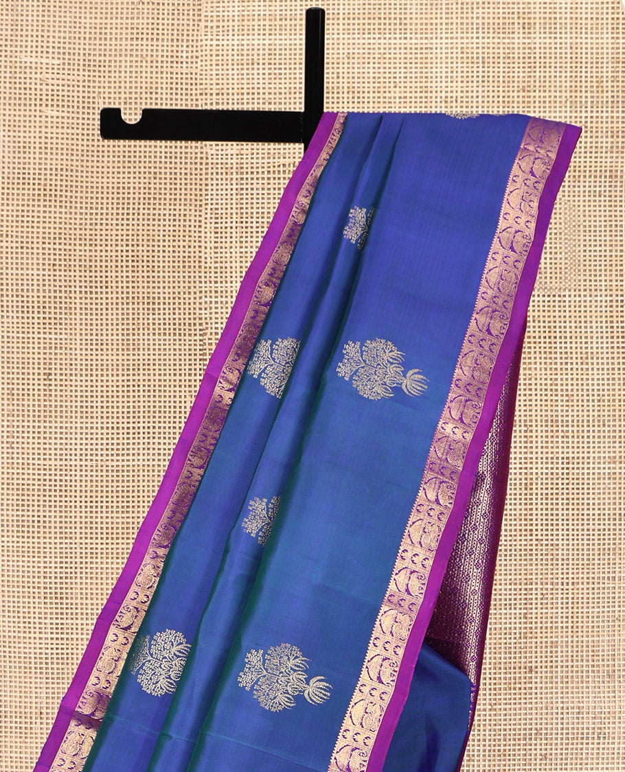 Blue Kanchipuram Silk Saree, Uniquely Designed with Zari Buttas on Its Body, Complemented by Contrast Border of Rekku, Thazampoo Rekku, and Annam Designs, Intricately Designed Pallu, and Paired with a Contrast Blouse