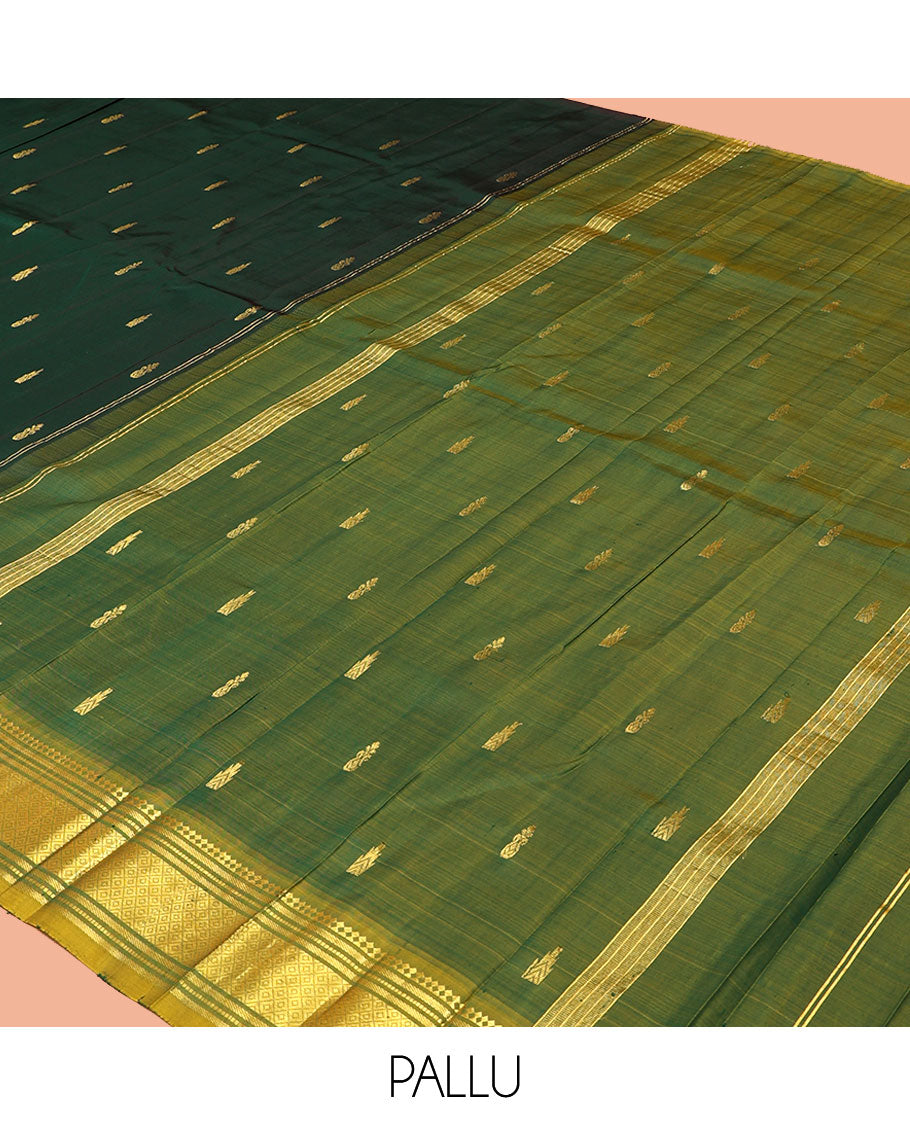 Green Kanchipuram Silk Saree, Detailed with Zari Buttas, a Contrast One-Sided Border of Paneer Sombu, Banaras, Muthu, and Mayil Kann Designs, a Zari Design Pallu, and No Blouse