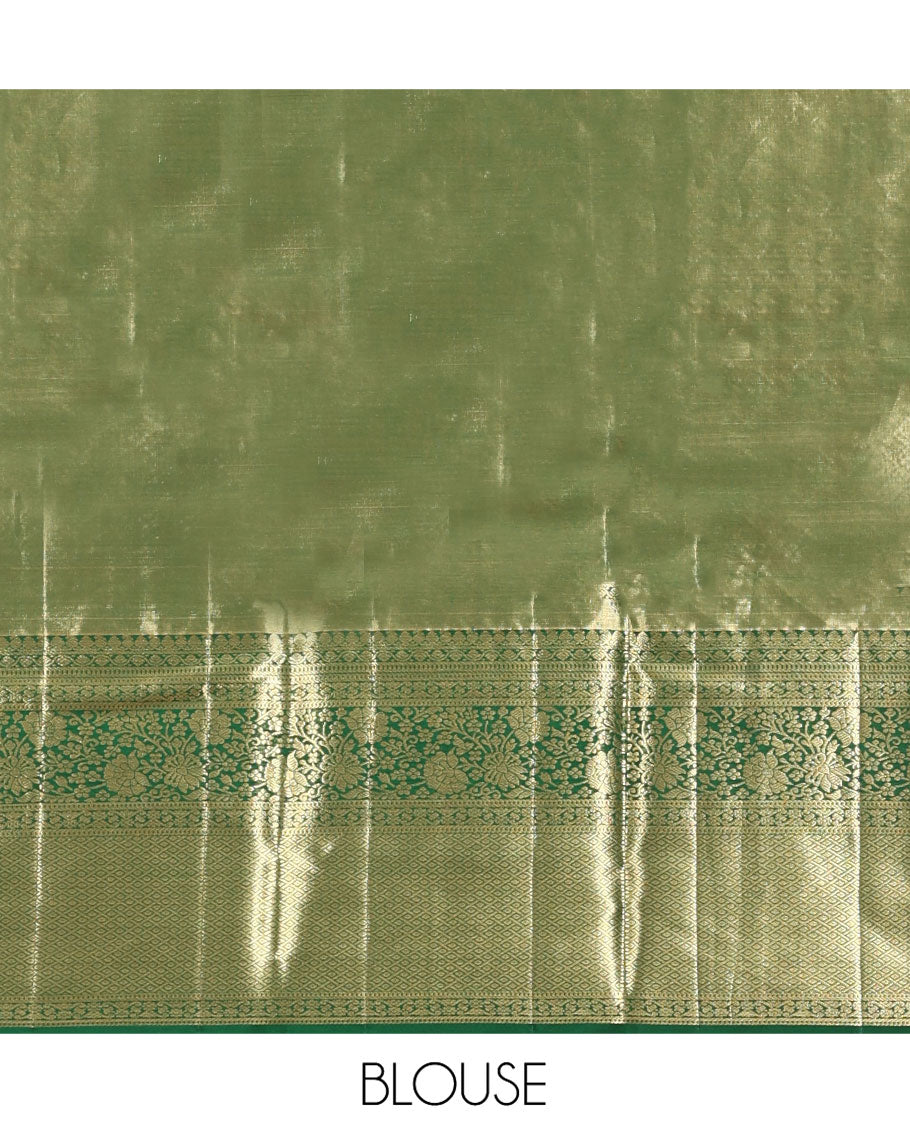 Green Kanchipuram Tissue Silk Saree, Majestically Detailed with Jacquard Designs on Its Body, Highlighted by a Zari Border of Jaal, and Floral Designs, Intricately Designed Pallu, and Paired with a Matching Blouse