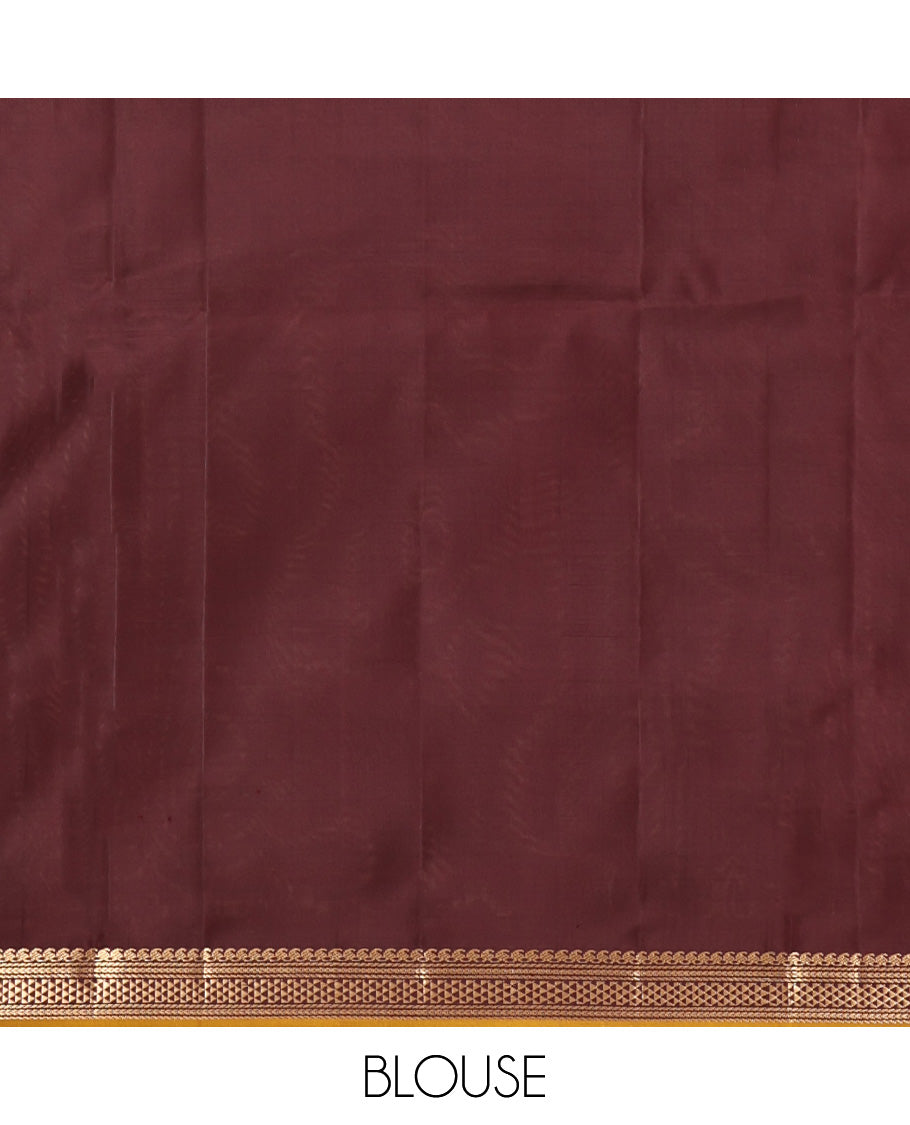 Orange Mayuri Soft Silk Saree, Accentuated with Zari Buttas All Over Its Body, Highlighted by Zari Border of Manga Mokku, and Ara Maadam Designs, and Paired with a Contrast Geometric Patterned Pallu and Paired with a Contrast Blouse