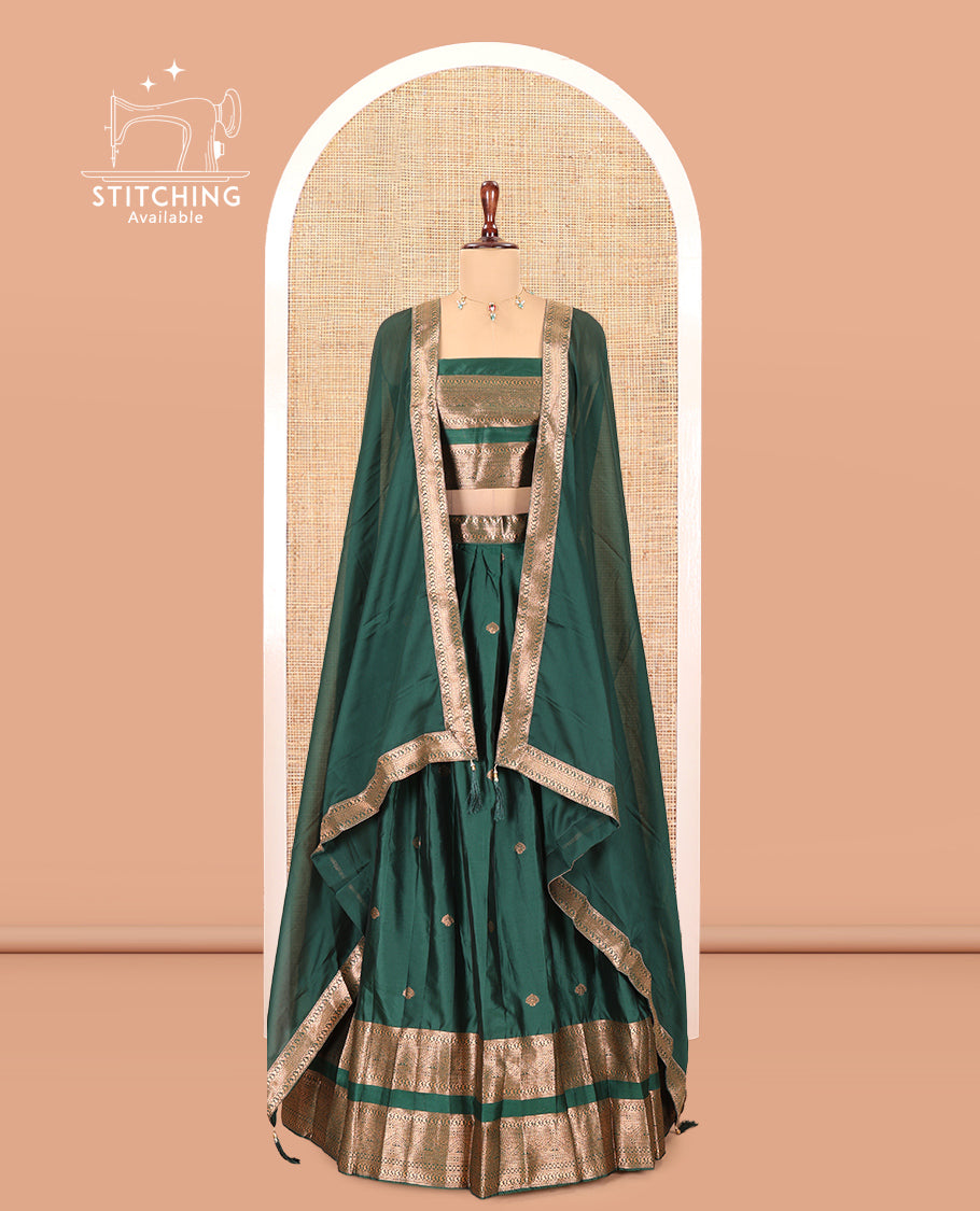 Green Semi-Silk Half-Saree, Adorned with Zari Buttas Woven Skirt, a Rettai Pettu Traditional Border, a Matching Blouse, and Dhavani
