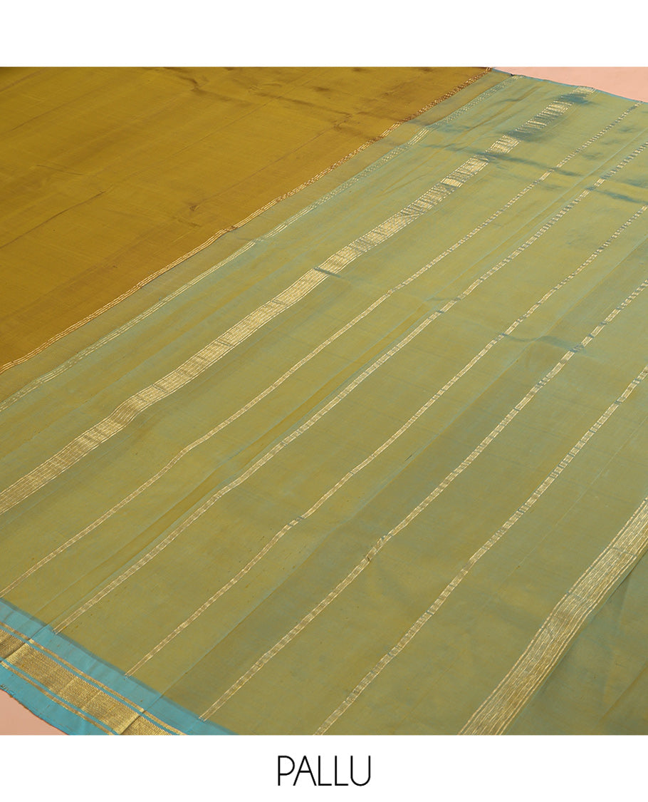 Green Plain Kanchipuram Silk Saree, a Contrast Zari One-sided Border, Zari Striped Pallu, and No Blouse