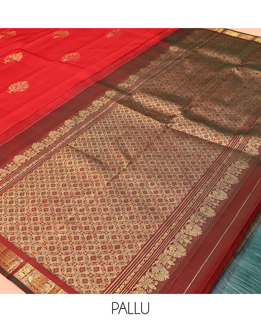Red Kanchipuram Silk Saree, Decked Up with Zari Buttas All Over Its Body, Complemented by a Contrast Border of Ara Bogudi, Yaanai, and Annam Designs, Grand Pallu, and Paired with a Contrast Blouse