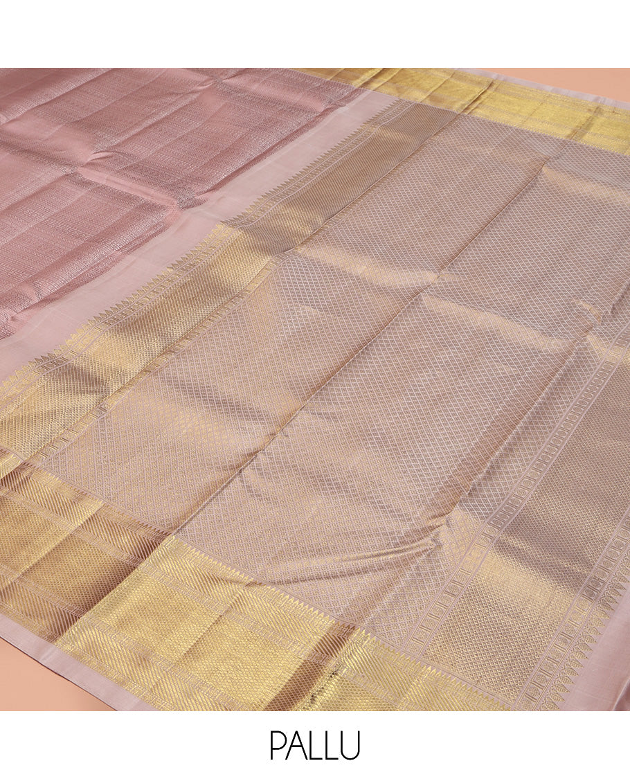Baby Pink Geometric Embossed Parampara Silk Saree, Gleamed up with Zari Border of Rekku, Poun, Mayil Kann, and Zari Stripes, and Grand Jaal Pallu and Paired with a Matching Blouse