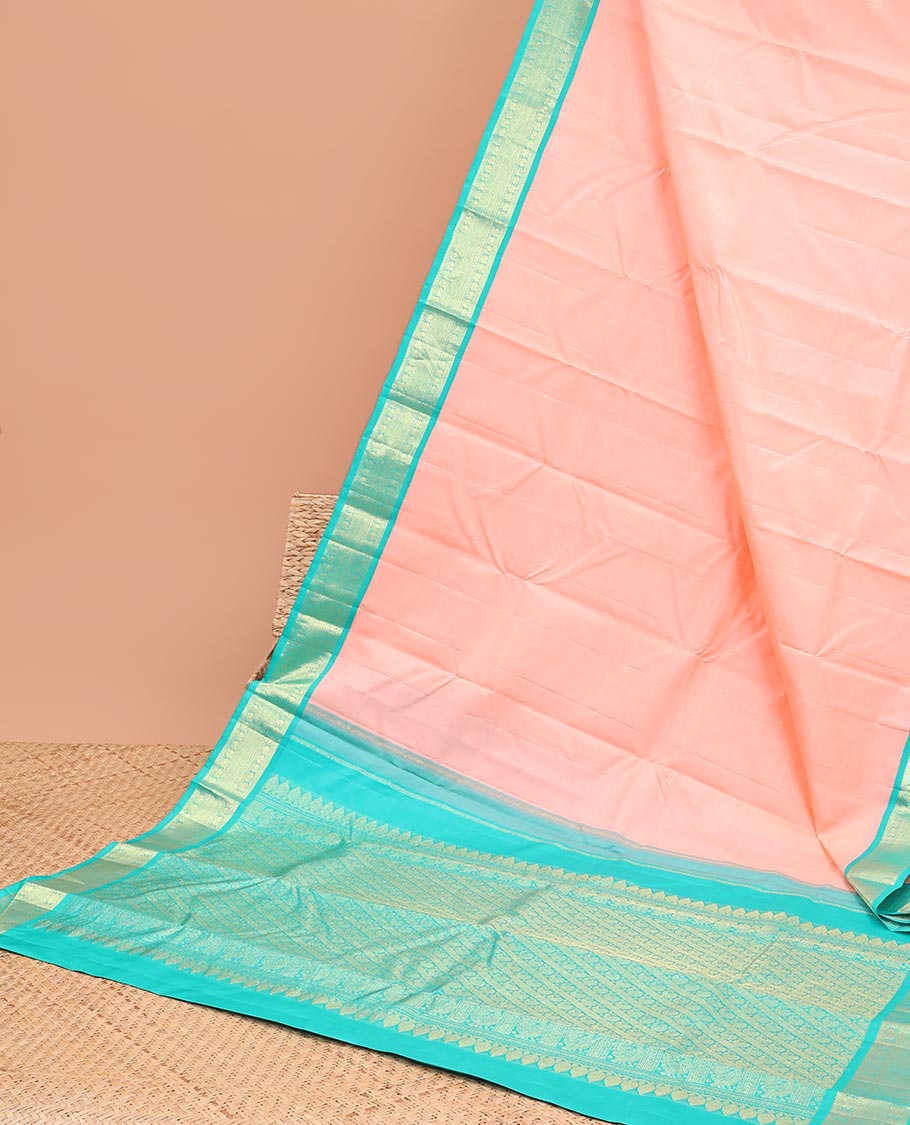 Pink kancheepuram silk saree with contrast korvai zari design border & striped, floral zari design pallu
