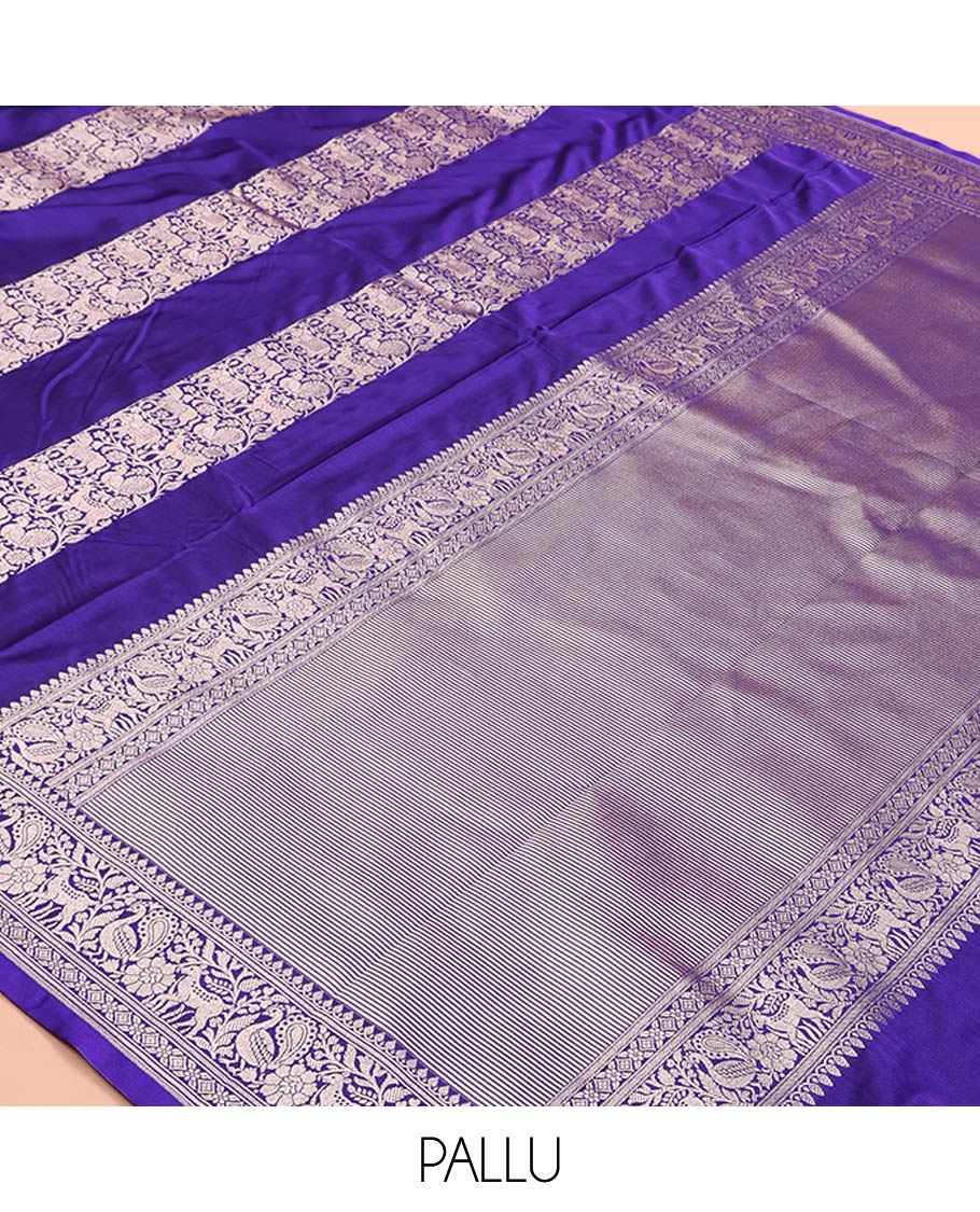 Blue Mushuru Silk Saree, Elegantly Decked Up with Vertically Woven Flora-Fauna Zari Designs On Its Body, Highlighted by Zari Border of Peacock and Deer Motifs, Grand Pallu, and Paired with a Plain Blouse