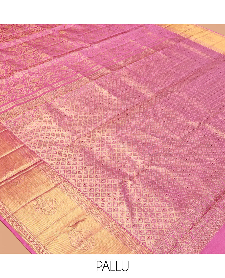 Pink Kanchipuram Wedding Silk Saree, Spotlighted with Jacquard Design, a Traditional Zari Border, a Grand Jaal Pallu, and a Matching Blouse