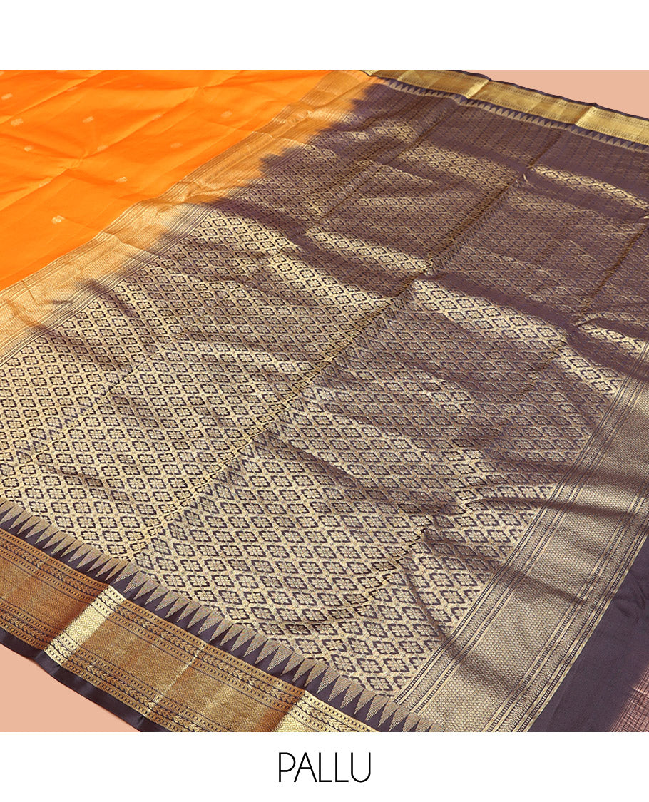 Orange Vasundhara Silk Saree, Artfully Woven with Mayil Buttas All Over Its Body, Complemented by Contrast Border Featuring Thazampoo Rekku, Muthu, Lavangam, and Mayil Kann Designs, a Grand Pallu of Jaal Designs, and Paired with a Contrast Blouse