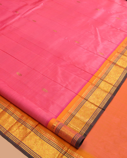 Pink Kanchipuram Silk Saree, Ornamented with Zari Buttas, a Contrast One-Sided Border of Paneer Sombu, Banaras, Muthu, and Jaal Design, Zari Design Pallu, and No Blouse