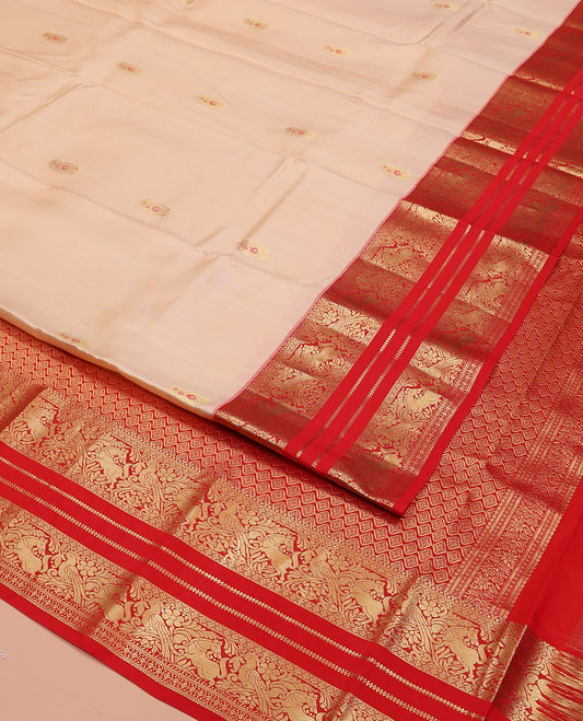 Sandal Vasundhara Silk Saree, Graced with Zari Meena Buttas All Over Its Body, Complemented by a Contrast Border of Diamond, Mayil, and Kuthirai Designs, Grand Jaal Pallu, and Paired with a Contrast Blouse