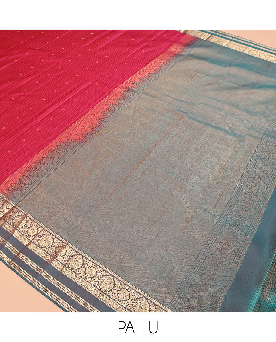 Red Vasundhara Silk Saree, Spotlighted with Zari Buttas and Stripes, a Contrast Rettai Pettu Border of Thilakam, Kamalam, Banaras, and Muthu Designs, Jaal Pallu, and Contrast Blouse