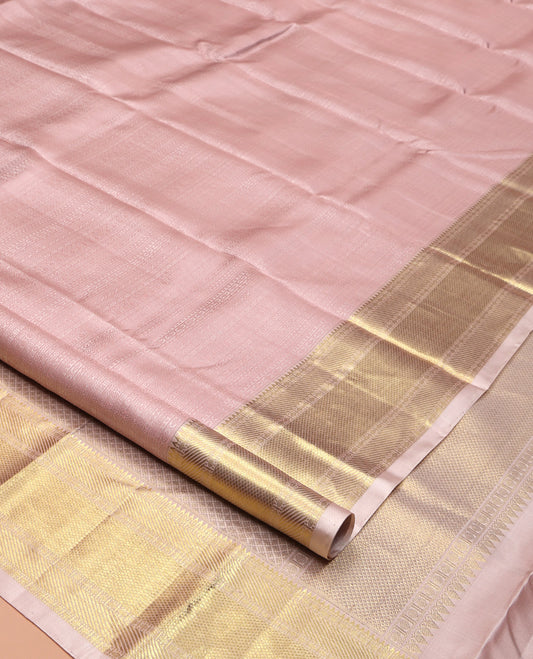 Baby Pink Geometric Embossed Parampara Silk Saree, Gleamed up with Zari Border of Rekku, Poun, Mayil Kann, and Zari Stripes, and Grand Jaal Pallu and Paired with a Matching Blouse