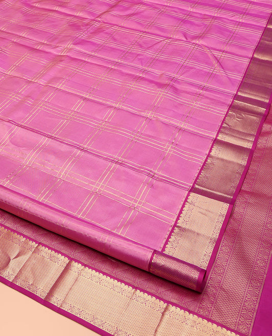 Pink Kanchipuram Silk Saree, Gleamed Up with Zari Checked Design on Its Body, Complemented by a Contrast Border of Manga, Rekku, Cross Kamalam, and Mayil Kann Designs, Grand Jaal Pallu, and Paired with a Contrast Blouse