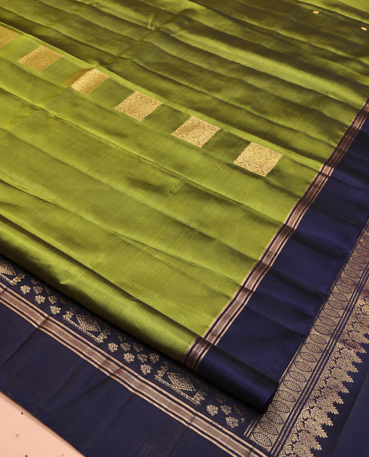 Green Mayuri Lite Silk Mix Saree, Gleamed Up with Square Buttas All Over Its Body, Complemented by Contrast  Border, Intricately Designed Pallu, and Paired with a Contrast Blouse