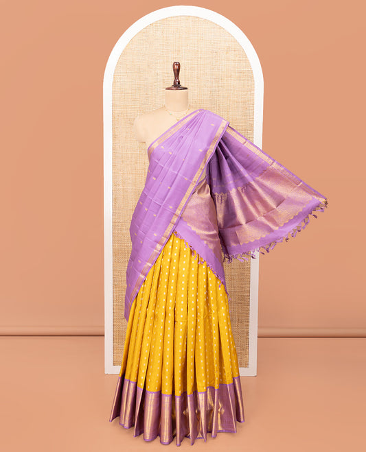 Yellow Pure Silk Half-Saree, Artfully Detailed with Mayil-Chakram Buttas on Its Skirt, Complemented by a Contrast Border of Rekku, Muthu, Diamond, Chakram, and Jaal Designs, Comes with a Contrast Blouse and a Dhavani of Jacquard Design