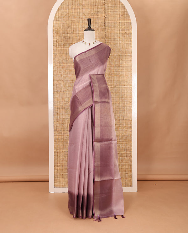 Lavender plain tissue saree, contrast gold zari piping border & self pallu with tussels