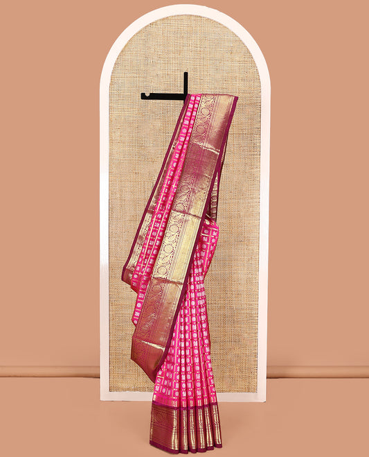 Pink striped Venkatagiri silk saree, contrast traditional zari design border, and intricately designed pallu
