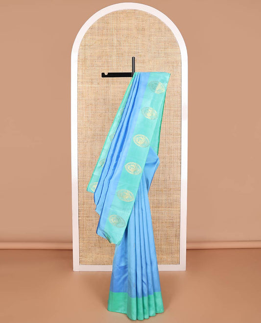Blue buttas kancheepuram silk saree with contrast mayil design border & floral design pallu