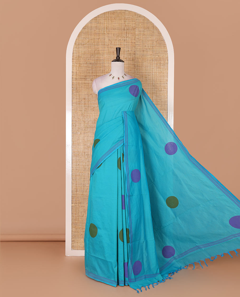 Blue big polka dots printed poly cotton saree, horizontal stripes printed border, polka dots printed pallu, and contrast handblock printed blouse