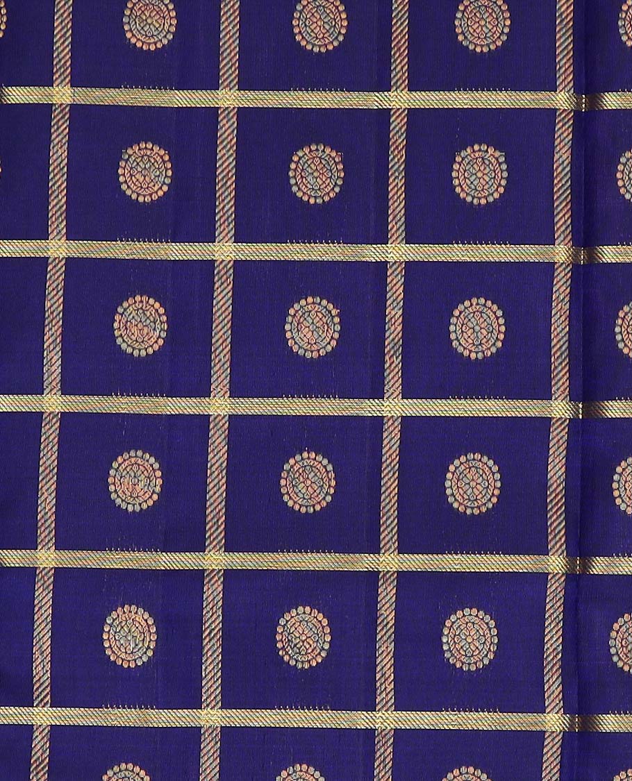 Blue pure silk half saree, chakram enclosed checked skirt, contrast zari design blouse, border of rudraksham, manga and mayil kann designs, and intricate dhavani