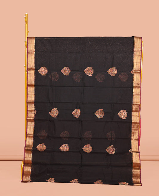 Black Semi-Silk Cotton Saree, Gleamed Up with Buttas on Its Body, Complemented by a Contrast Traditional Motifs Zari Woven Border, Intricately Designed Pallu, and Paired with a Contrast Blouse