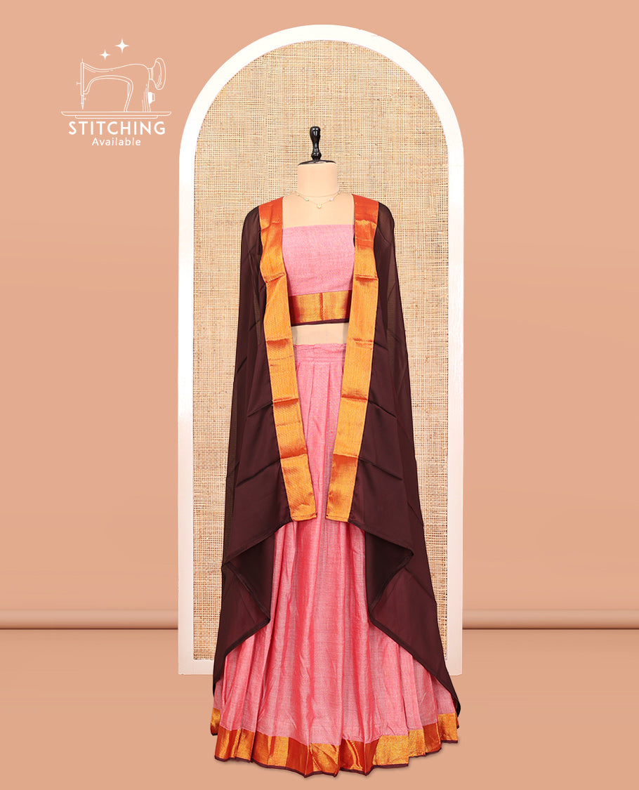 Pink Cotton Half-Saree Features Plain Skirt, a Contrast Zari Border, a Matching Blouse, and a Contrast Dhavani