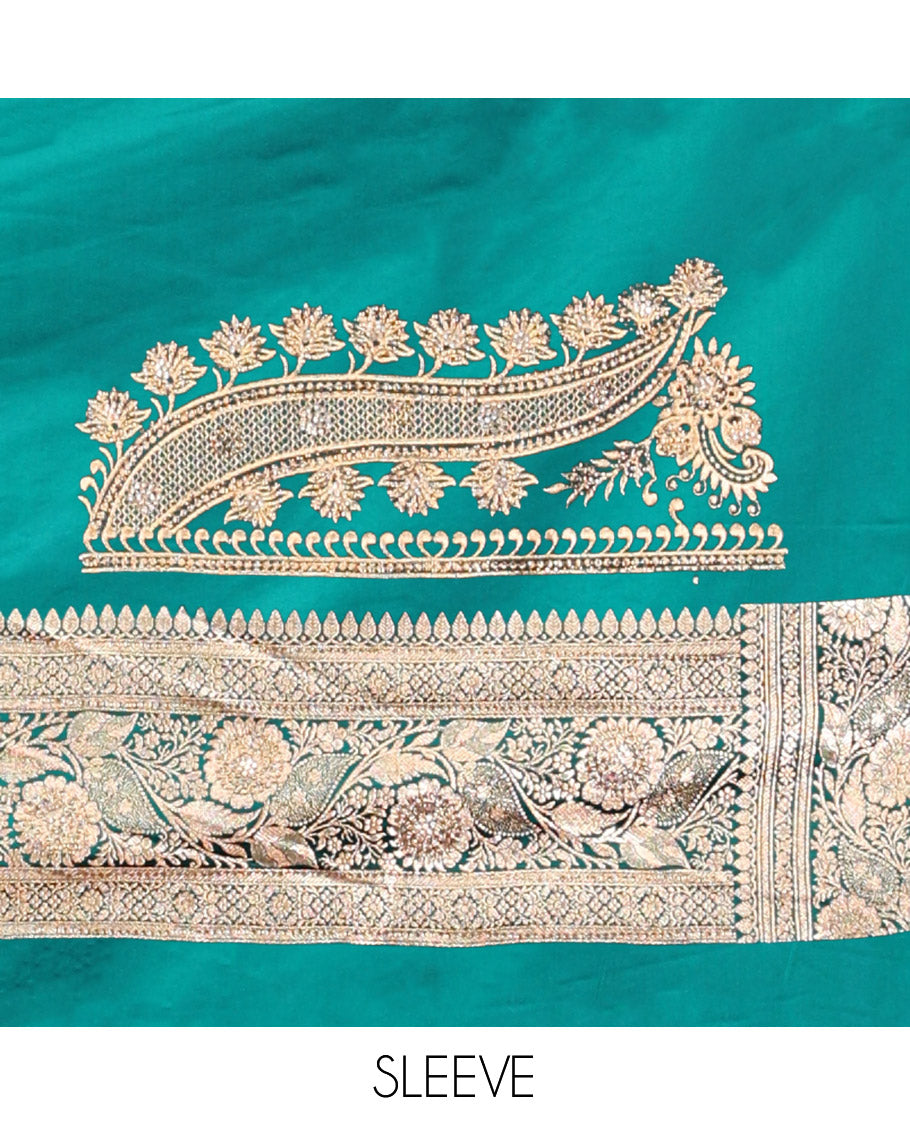 Green Banarasi Satin Saree, Bedecked with Floral Buttas, a Floral Creeper Border, Intricate Stonework Pallu, and a Matching Blouse