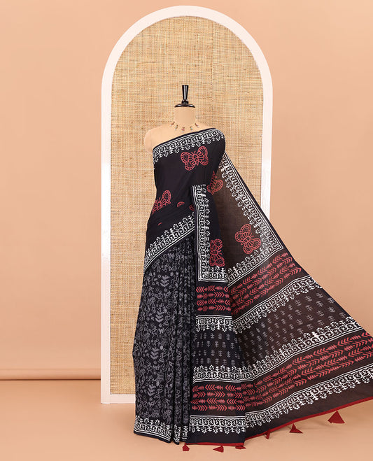 Black half-and-half style butterflies and warli theme  block printed soft mul cotton saree, printed border, floral printed pallu, and a plain blouse