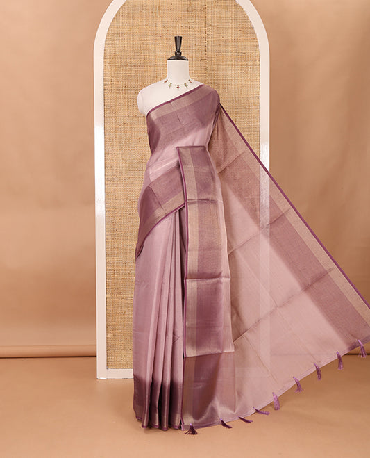 Lavender plain tissue saree, contrast gold zari piping border & self pallu with tussels