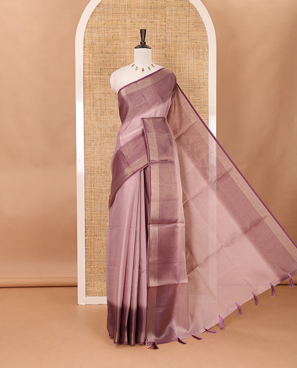 Lavender plain tissue saree, contrast gold zari piping border & self pallu with tussels