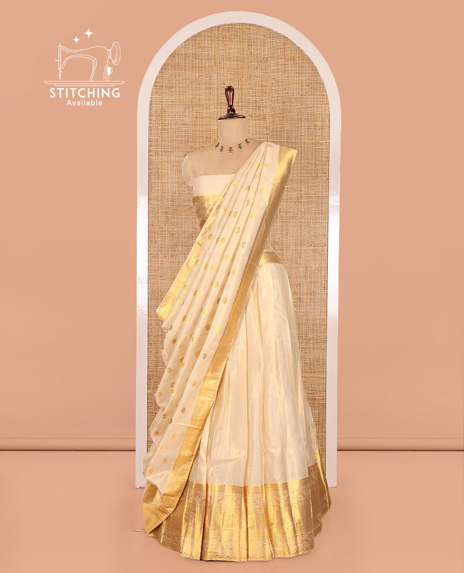 Cream Semi-Banarasi Tissue Half-Saree Features a Plain Skirt, a Traditional Border, Matching Blouse, and Intricate Dhavani