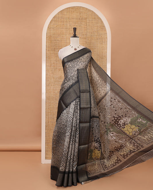 Chikku lehariya stripes printed semi-jute saree, contrast geometric zari border, printed pallu, & black blouse of print & zari work