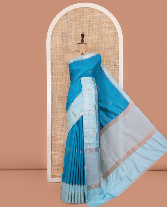Rama Blue Green-Mango-Silk Saree, Adorned with Zari Buttas All Over Its Body, Complemented by a Contrast Meenakari Zari Border of Floral Designs, Gleaming Zari Pallu, and Paired with a Contrast Blouse