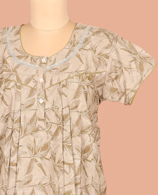 Light Sandal Cotton Nighty Bedecked with Floral Patterns Print, Featuring Lace Work, Round Front Neck, and Half Sleeves