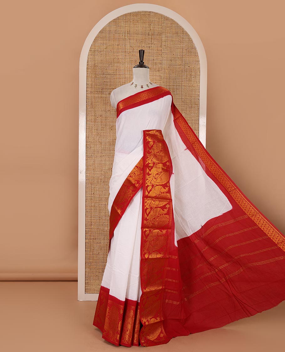White plain sungudi cotton saree, contrast big annam motifs woven zari border, zari striped pallu & zari design blouse