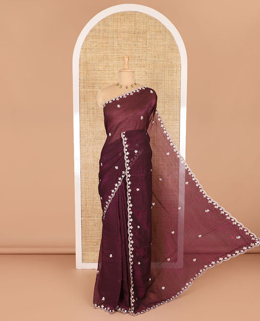Purple color, floral embroidered motifs crunchy crush saree, scallop pearl embroidered border,  embroidered pallu, and a contrast embroidered blouse