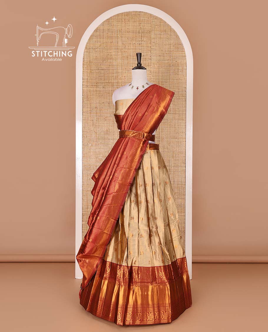 Gold banaras half saree, zari buttas with contrast maroon traditional zari border skirt, matching blouse, dhavaniof zari checks, and buttas