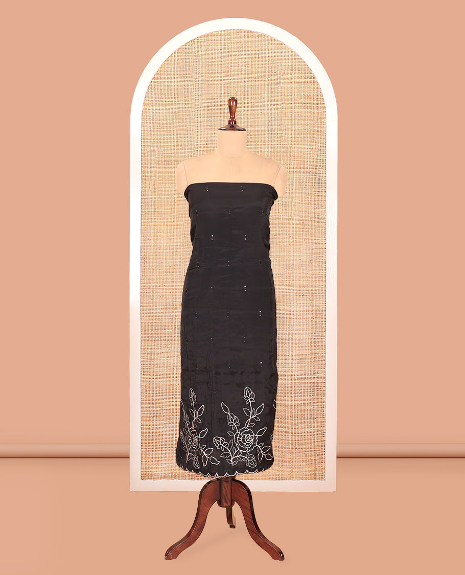 Black Mul Chanderi Material Churidar Features a Floral Outline Embroidered Top, a Santoon Bottom, a Scallop Threadwork Dupatta
