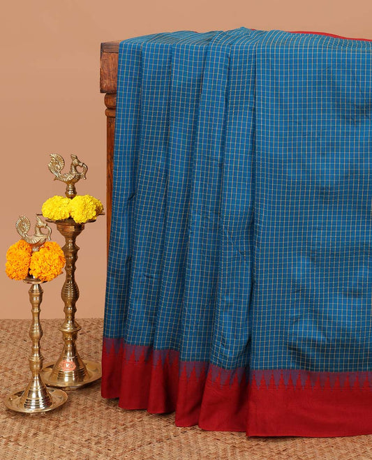 Blue checked kalyani cotton saree with contrast temple border & contrast rich reaving pallu along with contrast blouse