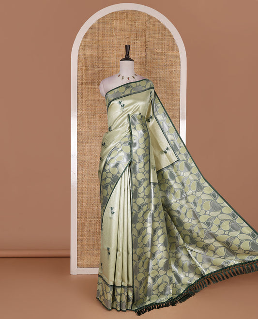 Pista green jacquard kanchi silk saree, contrast border, and pallu steeped with paisley motifs with contrast zari design blouse