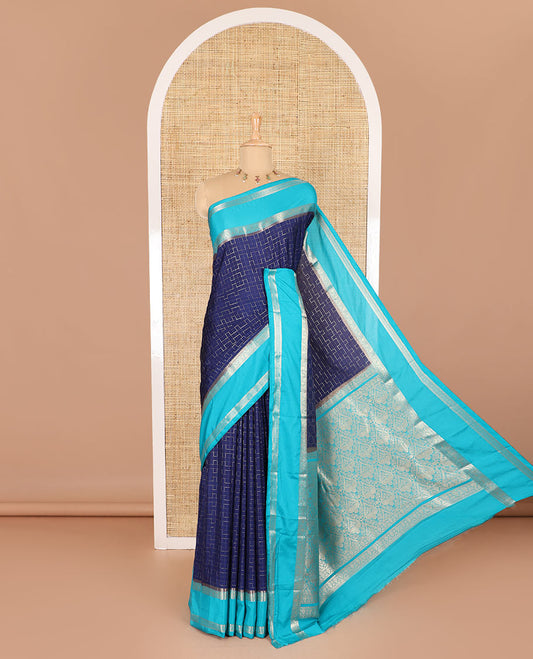Blue maze geometric-patterned semi-mysore silk saree, contrast rettai pettu traditional zari border, intricate pallu, and a contrast geometric-patterned zari-bordered blouse