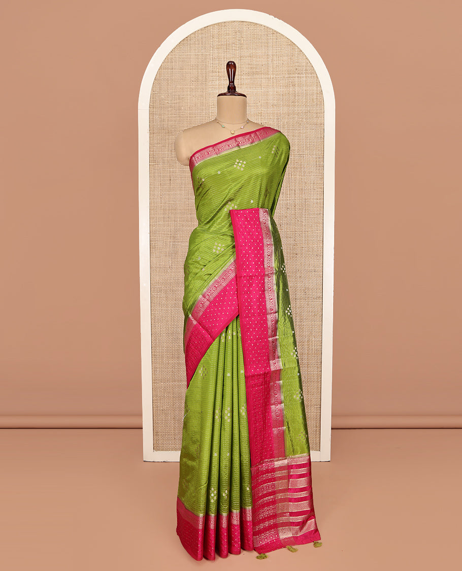 Green Semi-Banaras Dupion Saree, Detailed with Zari Buttas and Stripes, Complemented by Contrast Traditional Border, Zari Striped Pallu, and a Contrast Blouse