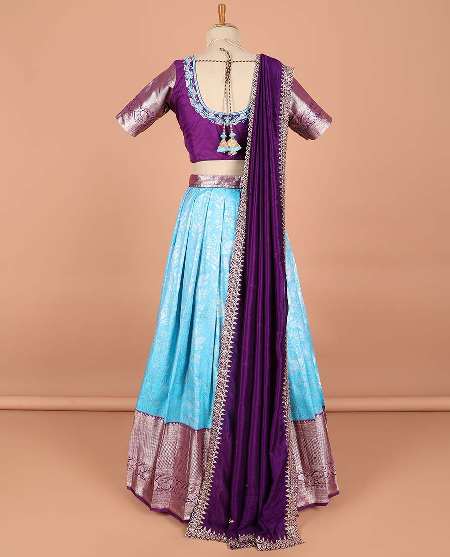 Blue floral jacquard semi-stitched half saree with contrast zari border,  embroidered blouse & scallop border dhavani