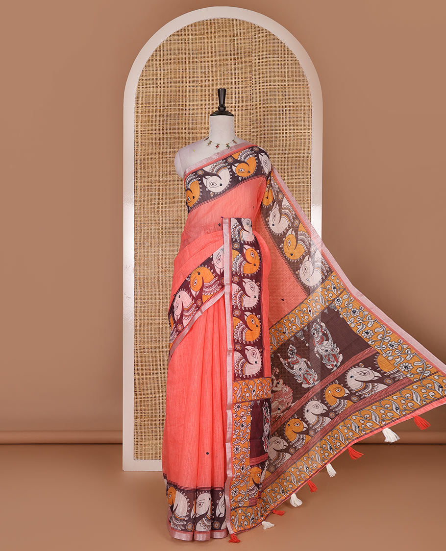 Peach mirror thread embroidered linen saree, contrast kalamkari peacock printed border, pallu of kalamkari peacock and human figurines print, and printed blouse