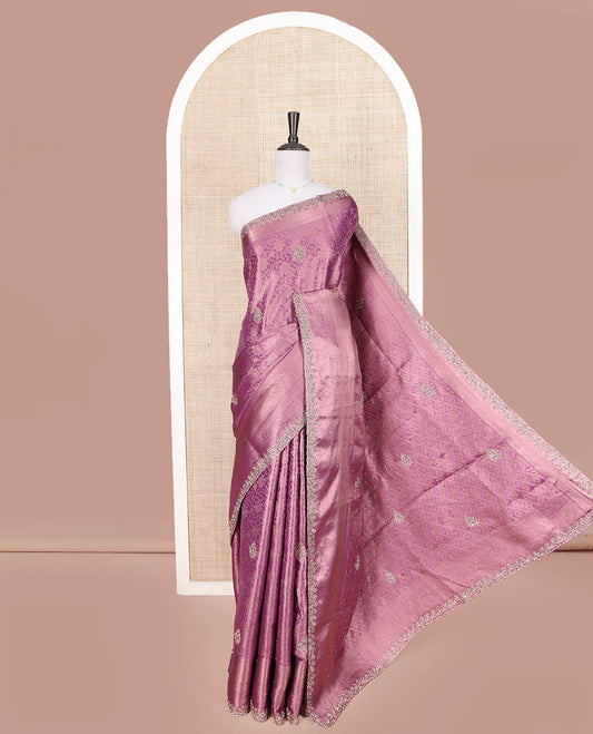 Purple Vastrakala Silk Saree, Spotlighted with Floral Jacquard and Patch Work, Highlighted by Traditional Zari Stone Embroidered Scallop Border, Grand Jaal Design Stone Work Pallu, and Paired with Heavy Embroidered Blouse