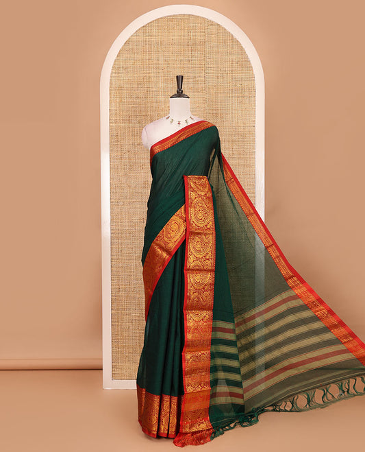 Green plain design mercerised cotton saree, contrast traditional peacock enclosed manga border, striped pallu & matching blouse